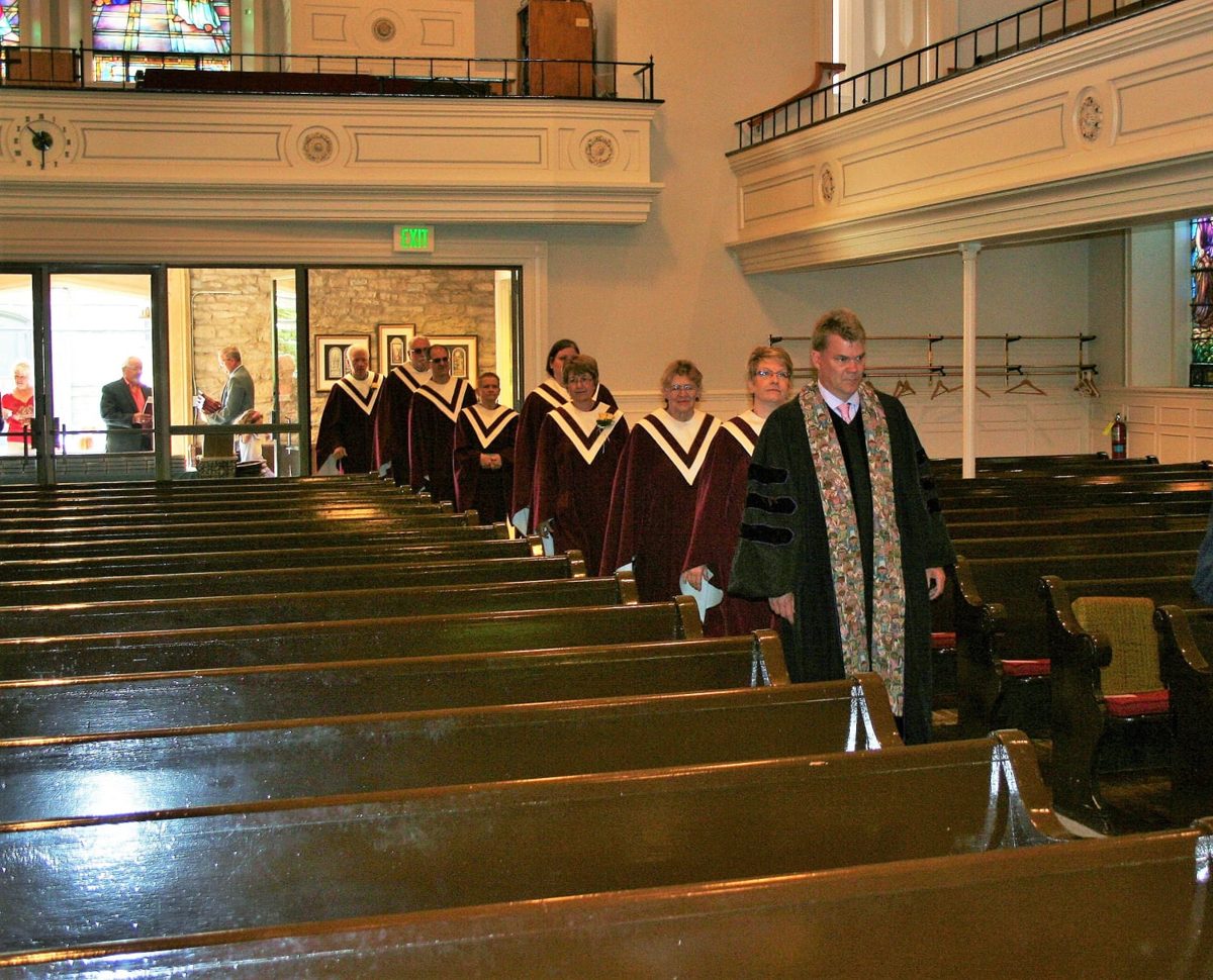 The Chancel Choir processing into the sanctuary in robes
